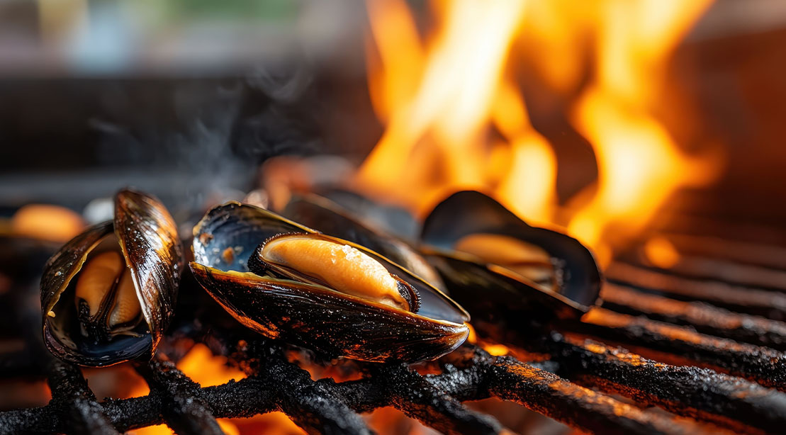 High-Protein Foods That Are Great for Grilling: Top 4 Under-the Radar, 4 High Protein food Mussels grilled on a open flame