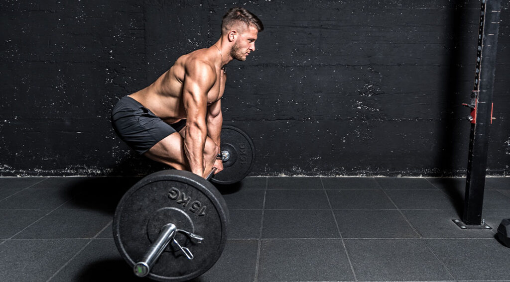The 15-Minute Heavy Deadlift EMOM Workout To Build Strength Fast 2 Strong muscular male performing a 15 Minute Heavy Deadlift EMOM Workout