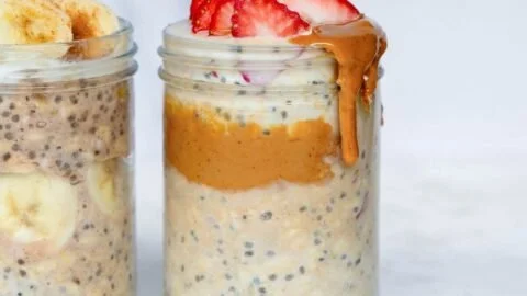 Bowl of high-protein overnight oats topped with fruits and nuts
