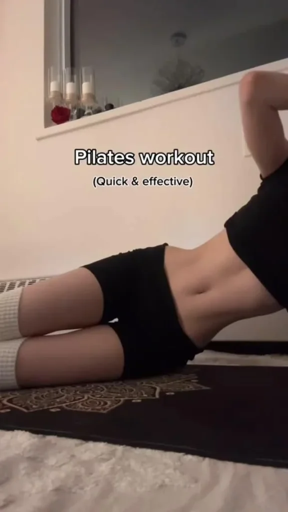 Leila demonstrating an abs workout at home with coaching tips on Instagram.